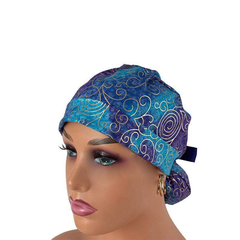 Turn Up Ponytail Medical Scrub Cap – Golden Swirls – Blue. - Image 2