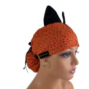 Ponytail Medical Scrub Cap - Black Dots Over Orange (Ears)